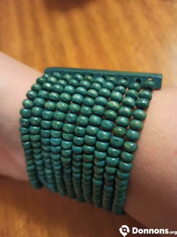 Bracelet élastique en perles de bois bleues