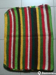 Housse coussin tricotée