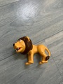 Petit lion en plastique
