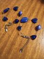 Lot de 2 bracelets à fil argenté & perles bleues